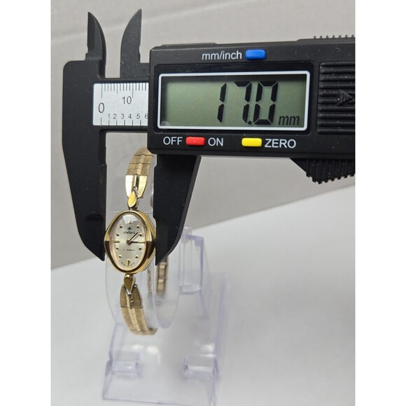 Vintage Stellaris 17 Jewels Swiss Made Womens Gold Tone Oval Wind Up Dress Watch main image 10